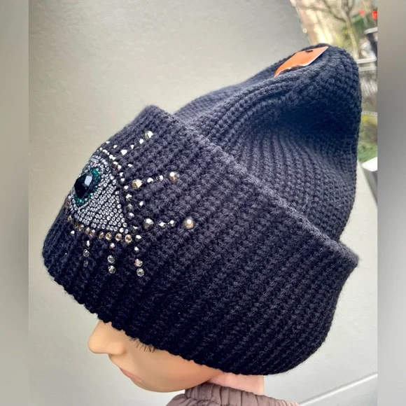 Black Beanie with Eye Design by Kurt Geiger.
NWOT - Picture 12 of 17